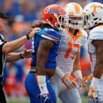 Florida Gators linebacker Daniel McMillan jaws with a Tennessee football player- 1280x853