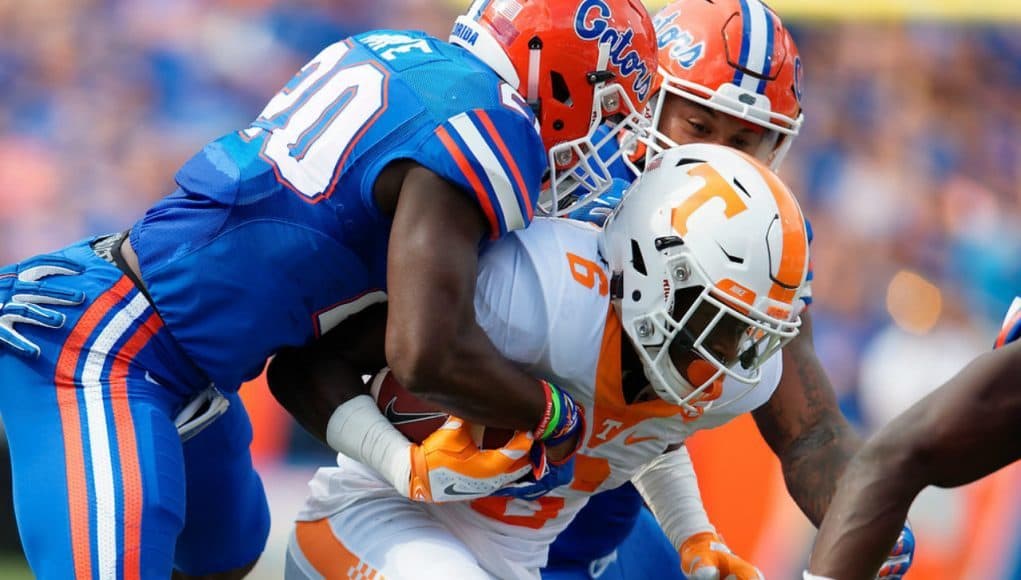 Florida Gators safety Marcus Maye talks Alvin Kamara of Tennessee in 2015- 1280x853