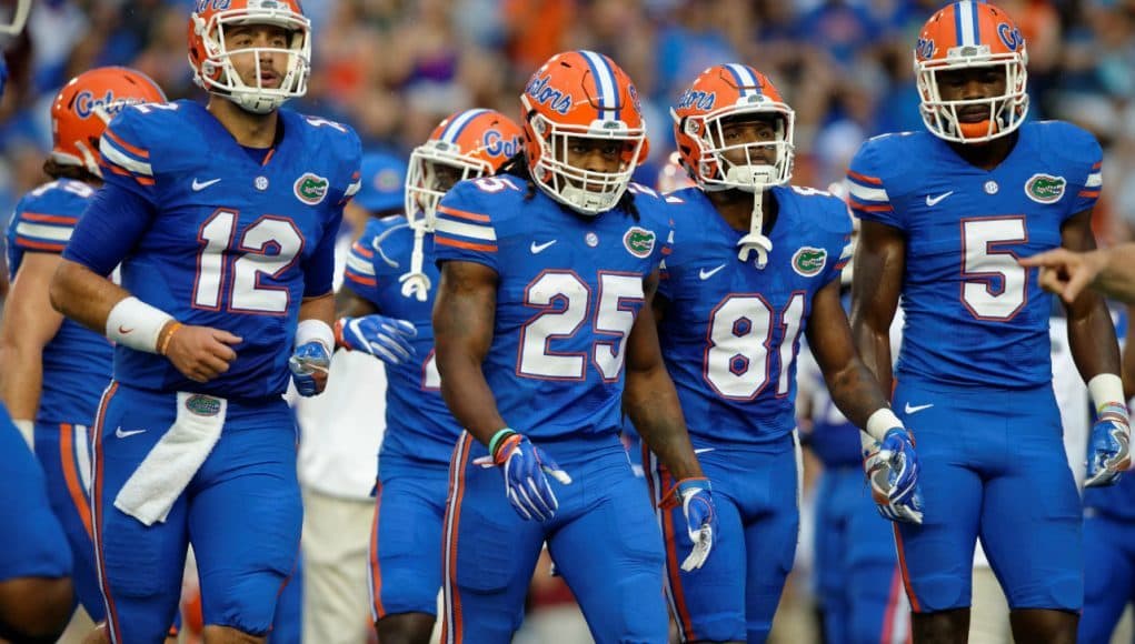 University of Florida football players take the field for warmups before the Florida Gators 2016 season opener against UMass- Florida Gators football- 1280x852