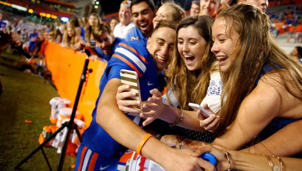 University of Florida kicker Eddy Pineiro celebrates the Gators win over UMass with fans- Florida Gators football- 1280x852