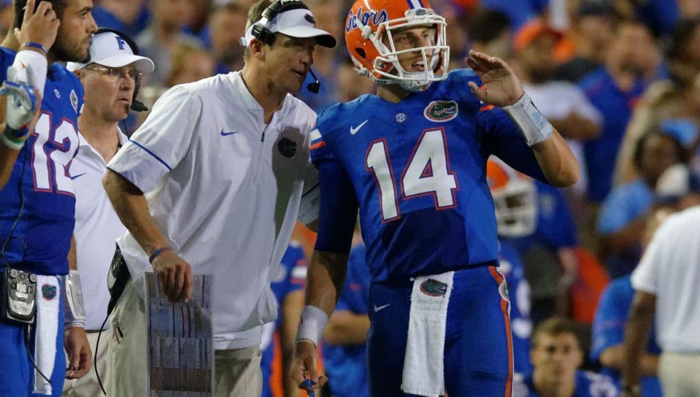 University of Florida quarterback Luke Del Rio discusses a play with offensive coordinator Doug Nussmeier in week one- Florida Gators football- 1280x852