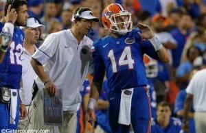 University of Florida quarterback Luke Del Rio discusses a play with offensive coordinator Doug Nussmeier in week one- Florida Gators football- 1280x852