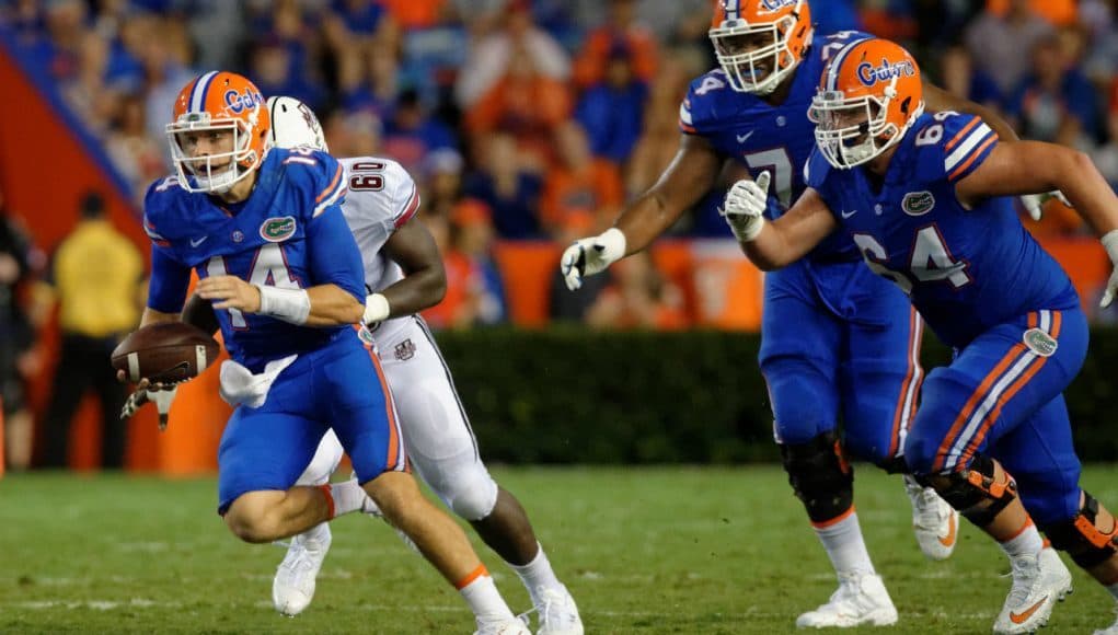 University of Florida quarterback Luke Del Rio scrambles from pressure during the Florida Gators win over UMass- Florida Gators football- 1280x852