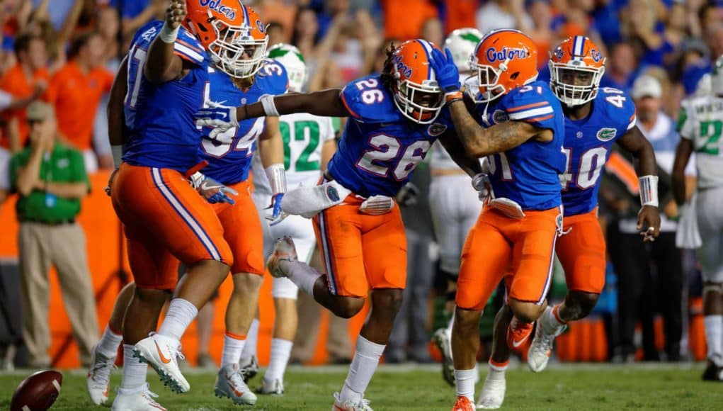 University of Florida safety Marcell Harris celebrates with teammates after his first career interception against North Texas- Florida Gators football- 1280x852