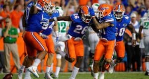 University of Florida safety Marcell Harris celebrates with teammates after his first career interception against North Texas- Florida Gators football- 1280x852