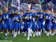 University of Florida senior defensive lineman Bryan Cox Jr. leads the team out onto the field before the home opener against UMass- Florida Gators football- 1280x852