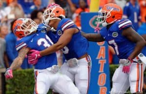 Florida Gators defensive back Teez Tabor celebrates with his teammates- 1280x853