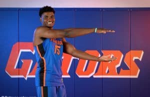 University of Florida big man John Egbunu chomps during basketball media day- Florida Gators basketball- 1280 x866