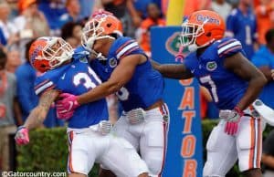 University of Florida cornerbacks Jalen Tabor, Duke Dawson and Quincy Wilson celebrate Wilson’s pick six against Missouri- Florida Gators football- 1280x852