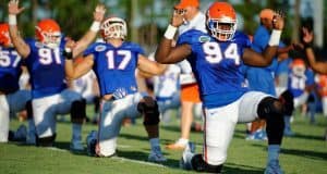 University of Florida defensive lineman Bryan Cox Jr. goes through stretched before a practice during fall camp- Florida Gators football- 1280x852
