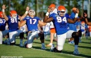 University of Florida defensive lineman Bryan Cox Jr. goes through stretched before a practice during fall camp- Florida Gators football- 1280x852