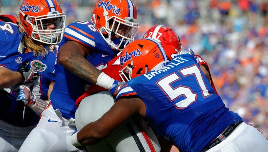 University of Florida defensive linemen Caleb Brantley and CeCe Jefferson stop Georgia running back Nick Chubb in the backfield- Florida Gators football- 1280x852