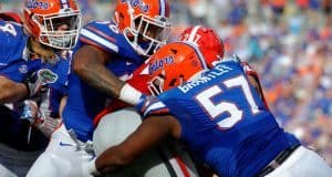 University of Florida defensive linemen Caleb Brantley and CeCe Jefferson stop Georgia running back Nick Chubb in the backfield- Florida Gators football- 1280x852