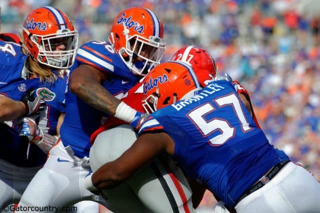 University of Florida defensive linemen Caleb Brantley and CeCe Jefferson stop Georgia running back Nick Chubb in the backfield- Florida Gators football- 1280x852