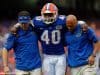 University of Florida linebacker Jarrad Davis is helped off of the field after sustaining an injury against Missouri- Florida Gators football-1280x852