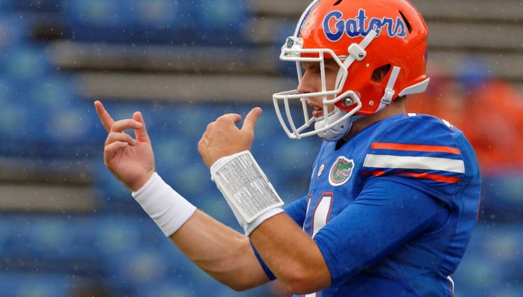 University of Florida quarterback Luke Del Rio warms up in the rain before the Florida Gators homecoming game against Missouri- Florida Gators football- 1280x852