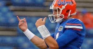 University of Florida quarterback Luke Del Rio warms up in the rain before the Florida Gators homecoming game against Missouri- Florida Gators football- 1280x852