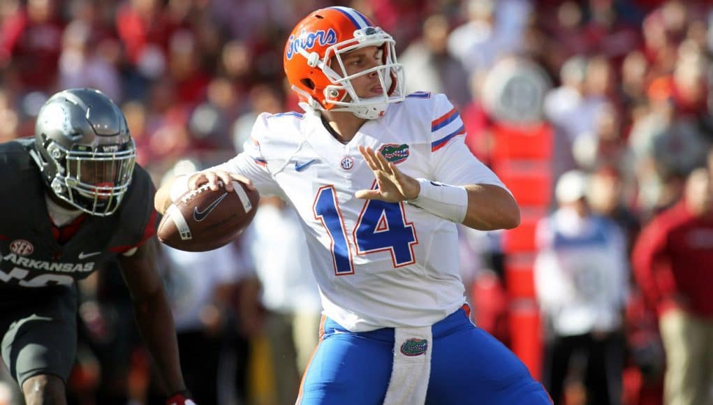 Nov 5, 2016; Fayetteville, AR, USA; Florida Gators quarterback Luke Del Rio (14) passes during the first quarter against the Arkansas Razorbacks at Donald W. Reynolds Razorback Stadium. Mandatory Credit: Nelson Chenault-USA TODAY Sports