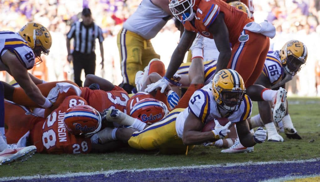 Nov 19, 2016; Baton Rouge, LA, USA; LSU Tigers running back Derrius Guice (5) is stopped short of the goal line on third down against the Florida Gators during the second half at Tiger Stadium. The Gators defeat the Tigers 16-10. Mandatory Credit: Jerome Miron-USA TODAY Sports