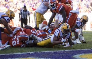 Nov 19, 2016; Baton Rouge, LA, USA; LSU Tigers running back Derrius Guice (5) is stopped short of the goal line on third down against the Florida Gators during the second half at Tiger Stadium. The Gators defeat the Tigers 16-10. Mandatory Credit: Jerome Miron-USA TODAY Sports