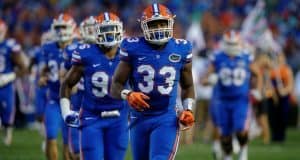 University of Florida freshman linebacker David Reese runs out onto the field for his first collegiate game with the Florida Gators- Florida Gators football- 1280x852