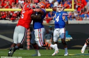 University of Florida quarterback Luke Del Rio throws a pass in a 24-10 win over the Georgia Bulldogs- Florida Gators football- 1280x852