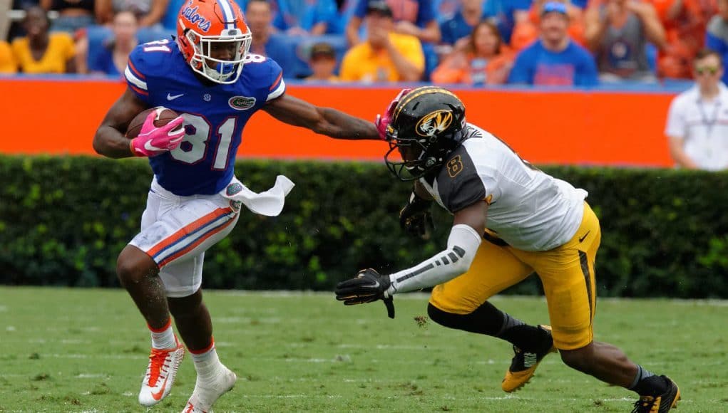 University of Florida receiver Antonio Callaway stiff arms a Missouri defender during a homecoming win- Florida Gators football- 1280x852