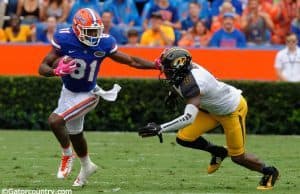 University of Florida receiver Antonio Callaway stiff arms a Missouri defender during a homecoming win- Florida Gators football- 1280x852