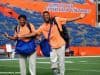 University of Florida senior Mark Herndon and sophomore CeCe Jefferson walk across Florida Field during Gator Walk - Florida Gators football- 1250x852