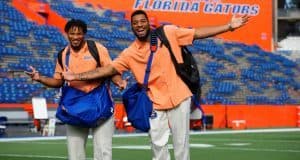 University of Florida senior Mark Herndon and sophomore CeCe Jefferson walk across Florida Field during Gator Walk - Florida Gators football- 1250x852