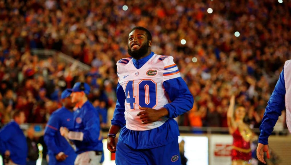 University of Florida senior linebacker Jarrad Davis runs onto the field at Doak Campbell Stadium- Florida Gators football- 1280x852