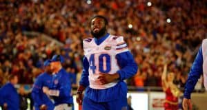 University of Florida senior linebacker Jarrad Davis runs onto the field at Doak Campbell Stadium- Florida Gators football- 1280x852