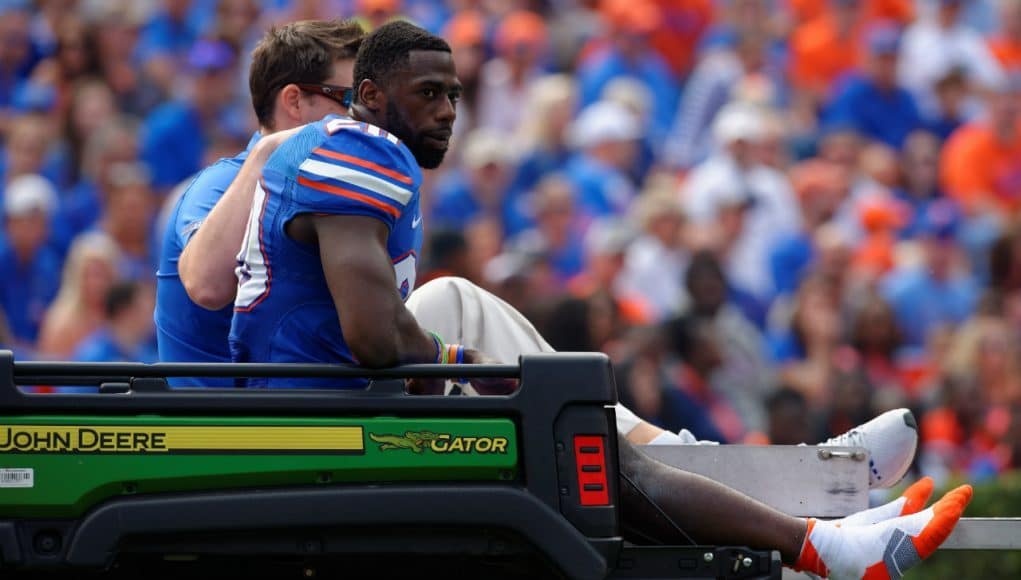 University of Florida senior safety Marcus Maye is carted off the field after breaking his arm on senior day- Florida Gators football- 1280x852