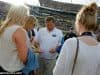 Florida Gators head coach Jim McElwain gives out gum to his daughters, a post game ritual for the family, after losing to the University of Michigan Wolverines - Florida Gators football- 1280x852