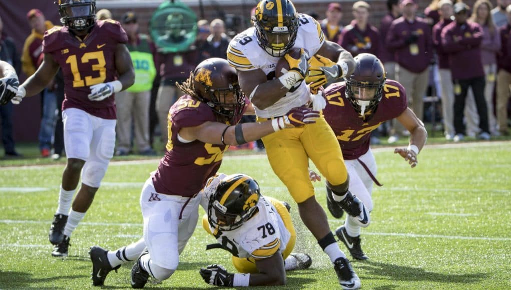 Oct 8, 2016; Minneapolis, MN, USA; Iowa Hawkeyes running back LeShun Daniels Jr. (29) rushes for a two point conversion as Minnesota Golden Gophers linebacker Jack Lynn (50) attempts to make a stop in the second half at TCF Bank Stadium. The Hawkeyes won 14-7. Mandatory Credit: Jesse Johnson-USA TODAY Sports