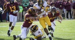 Oct 8, 2016; Minneapolis, MN, USA; Iowa Hawkeyes running back LeShun Daniels Jr. (29) rushes for a two point conversion as Minnesota Golden Gophers linebacker Jack Lynn (50) attempts to make a stop in the second half at TCF Bank Stadium. The Hawkeyes won 14-7. Mandatory Credit: Jesse Johnson-USA TODAY Sports