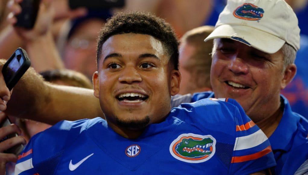 University of Florida cornerback Teez Tabor celebrates with fans after the Florida Gators win over the Georgia Bulldogs- Florida Gators football- 1280x852