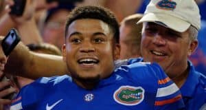 University of Florida cornerback Teez Tabor celebrates with fans after the Florida Gators win over the Georgia Bulldogs- Florida Gators football- 1280x852