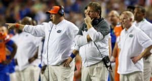 University of Florida head coach Jim McElwain and defensive coordinator Geoff Collins on the sideline during the SEC Championship- Florida Gators football- 1280x852