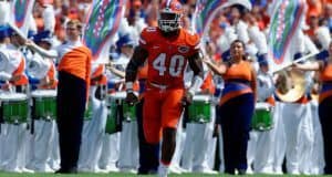 University of Florida linebacker Jarrad Davis runs out on to the field before the Gators game against Kentucky- Florida Gators football- 1280x852