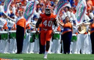 University of Florida linebacker Jarrad Davis runs out on to the field before the Gators game against Kentucky- Florida Gators football- 1280x852