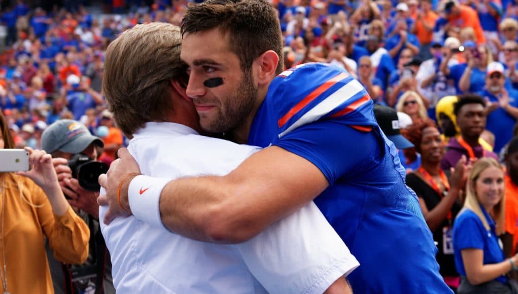 University of Florida quarterback Austin Appleby embraces head coach Jim McElwain during senior day ceremonies- Florida Gators football- 1280x855