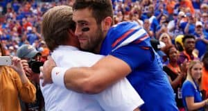 University of Florida quarterback Austin Appleby embraces head coach Jim McElwain during senior day ceremonies- Florida Gators football- 1280x855