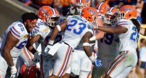 Chauncey Gardner is mobbed by teammates after returning an interception 58 yards for a score against Iowa in the Outback Bowl- Florida Gators football- 1280x852