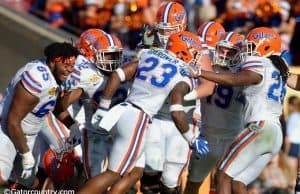 Chauncey Gardner is mobbed by teammates after returning an interception 58 yards for a score against Iowa in the Outback Bowl- Florida Gators football- 1280x852