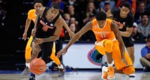 Florida Gators basketball guard Kasey Hill goes for the steal against Tennessee- 1280x853