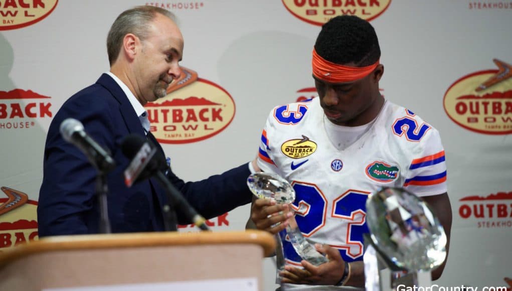 Florida Gators defensive back Chauncey Gardner with his Outback Bowl MVP trophy-1280x855