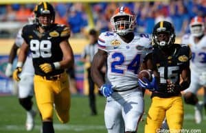 Florida Gators running back Mark Thompson scores against Iowa in the Outback Bowl- 1280x852