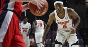 Jan 3, 2017; Gainesville, FL, USA; Florida Gators guard KeVaughn Allen (5) defends Mississippi Rebels guard Cullen Neal (2) in the first half at Exactech Arena at the Stephen C. O'Connell Center. Mandatory Credit: Logan Bowles-USA TODAY Sports
