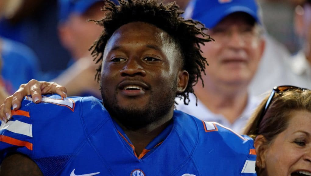 University of Florida cornerback Duke Dawson celebrates with fans after the Florida Gators win over Georgia- Florida Gators football- 1280x852